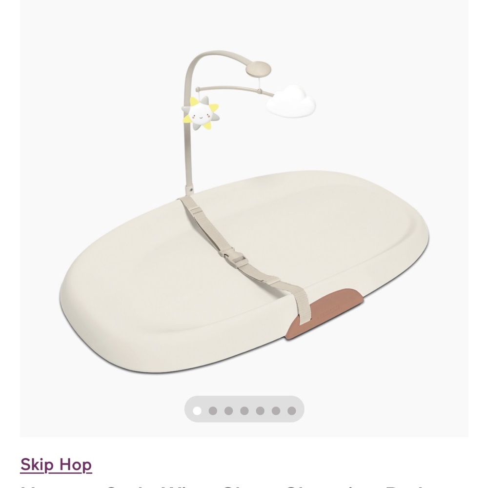 Skip Hop Cream Changing Pad with Toy Bar